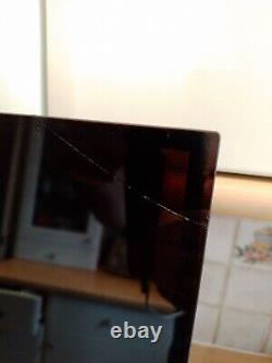 Smeg SE264TD 60cm Black 4 Zone Glass Ceramic. A corner of the hob is cracked